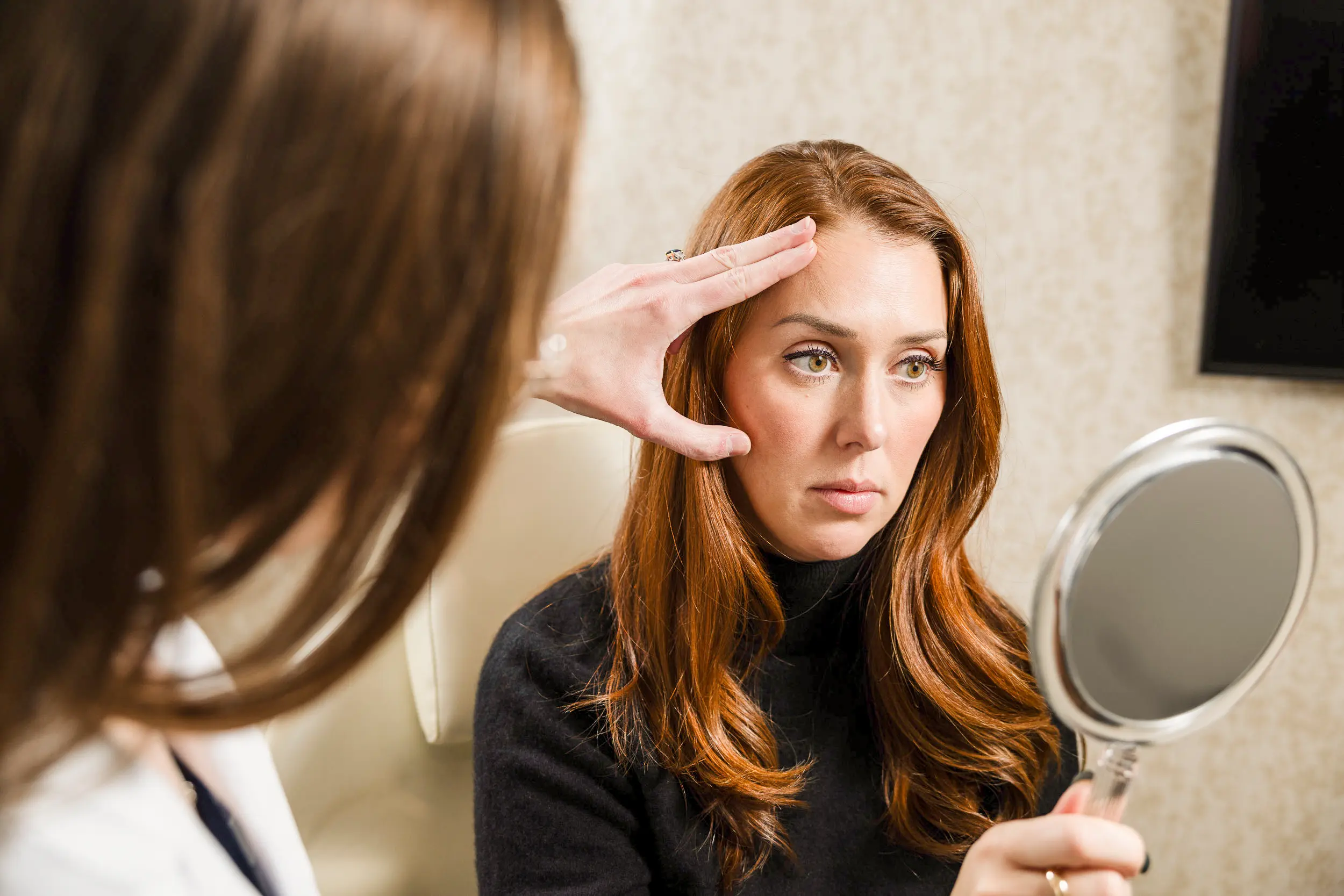 Brow lift consultation at IRIS Aesthetics in Longmont, CO