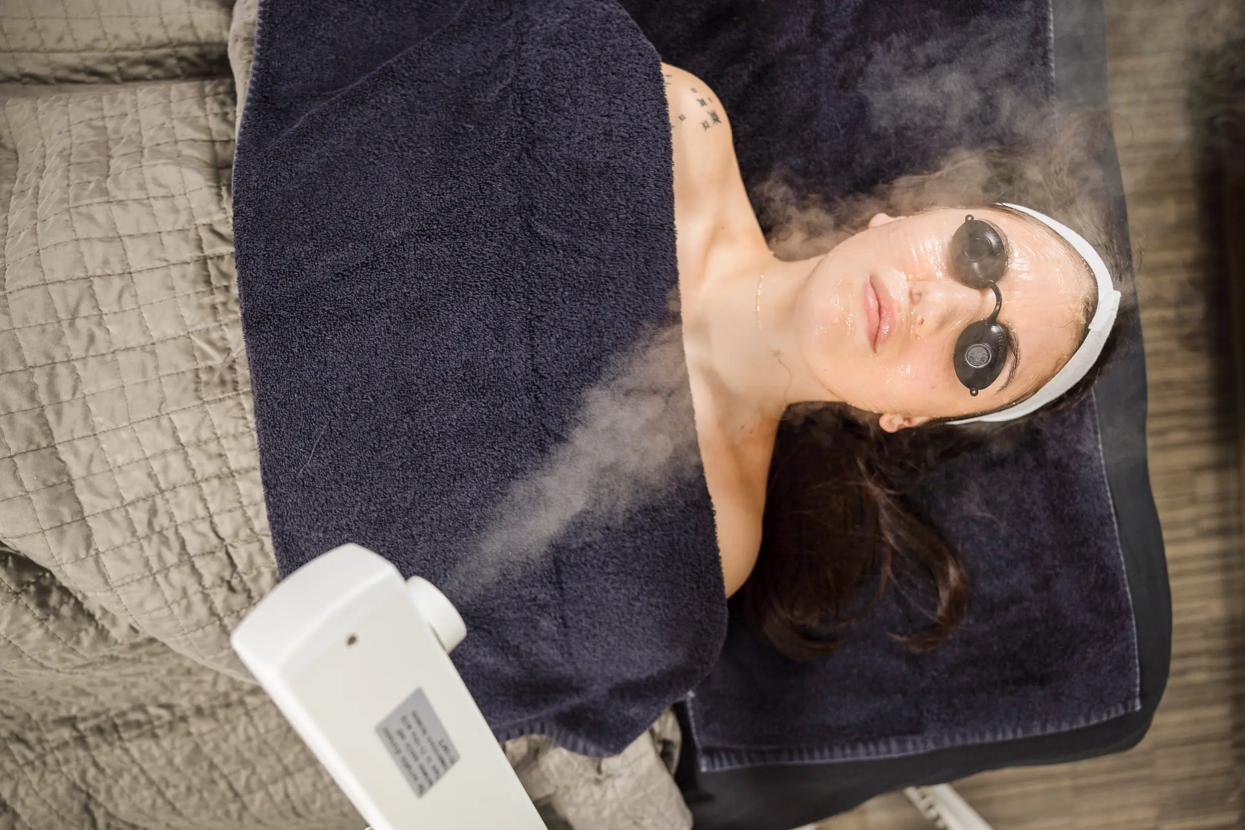 Facial treatment with steam at IRIS Aesthetics in Longmont, CO